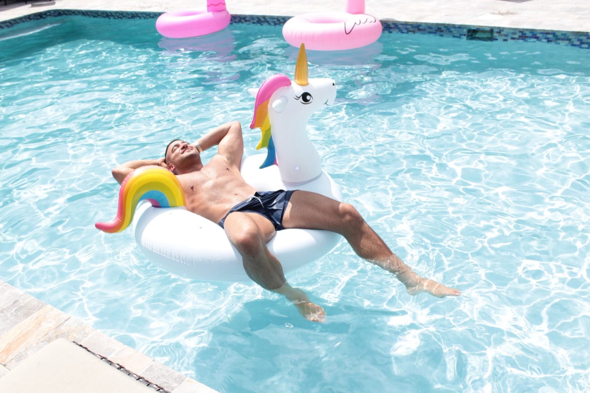 Guest relaxing poolside at Solstice at Wilton